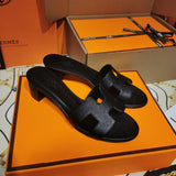 Hermès Black Slide Sandals - Sole Detail View