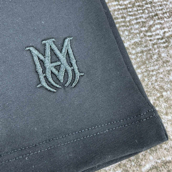 Three-quarter angle view of Amiri luxury piece style No.050