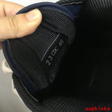 Dior Grey High-Top Sneakers - Angled View