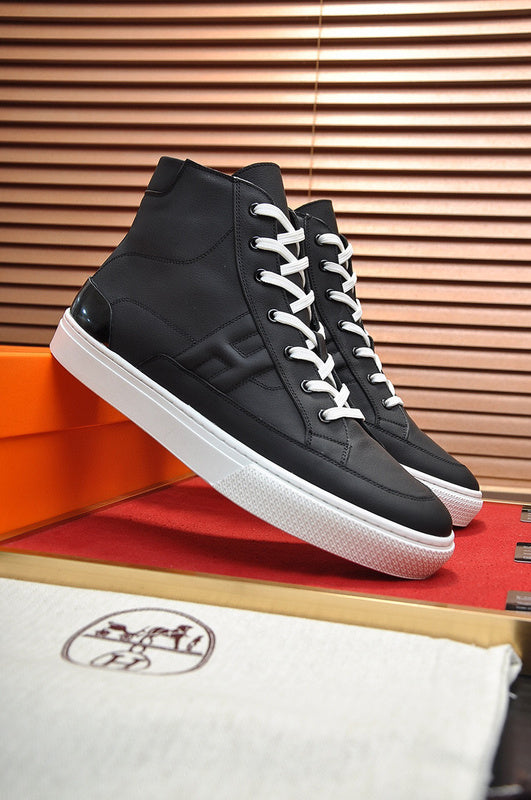 Hermès Black Slip-On Sneakers - Angled View