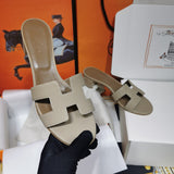 Hermès Beige Crisscross Strap Sandals - Close-Up Texture View