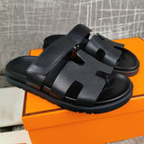 Hermes sandals Style 115 - close-up of classic monogram styling