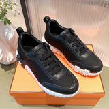 Hermès White High-Top Sneakers - Front View