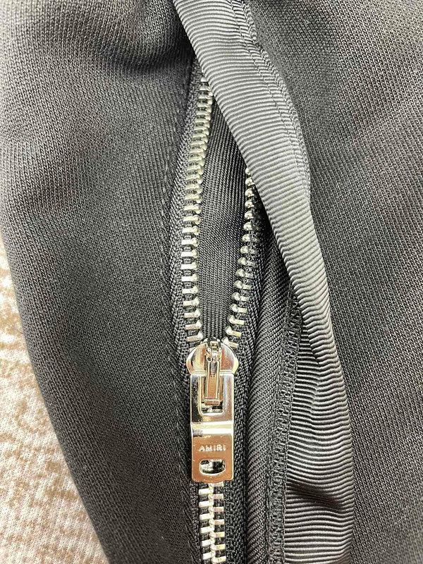 Texture and finish detail of Amiri luxury piece style No.049