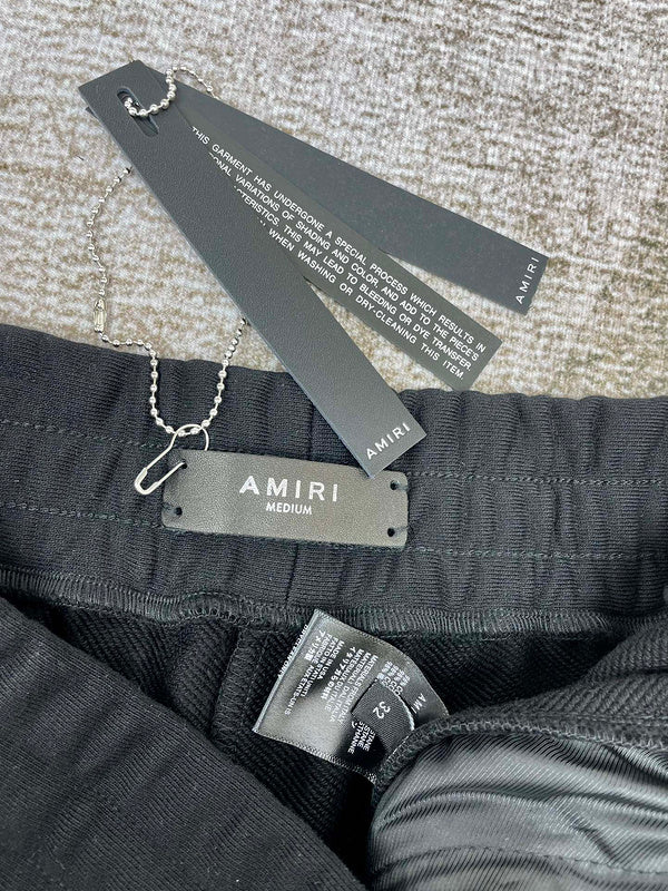 Texture and finish detail of Amiri luxury piece style No.071