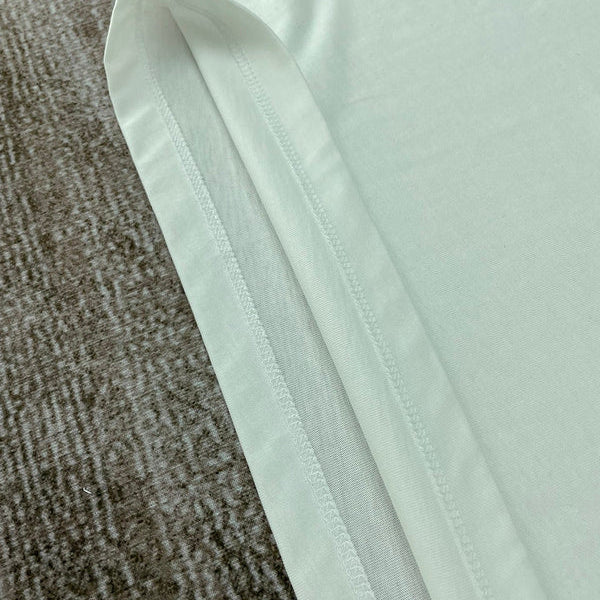 Three-quarter angle view of Amiri luxury piece style No.182