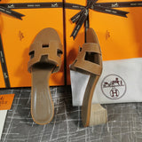 Hermès White Flat Thong Sandals - Sole Detail View
