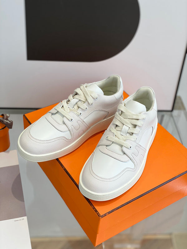 Hermes shoes Style 255 - close-up of classic monogram styling