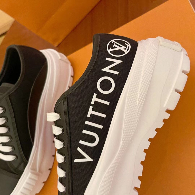 Louis Vuitton Black High-Top Sneakers - Full Silhouette View