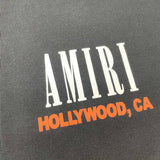 Three-quarter angle view of Amiri luxury piece style No.064