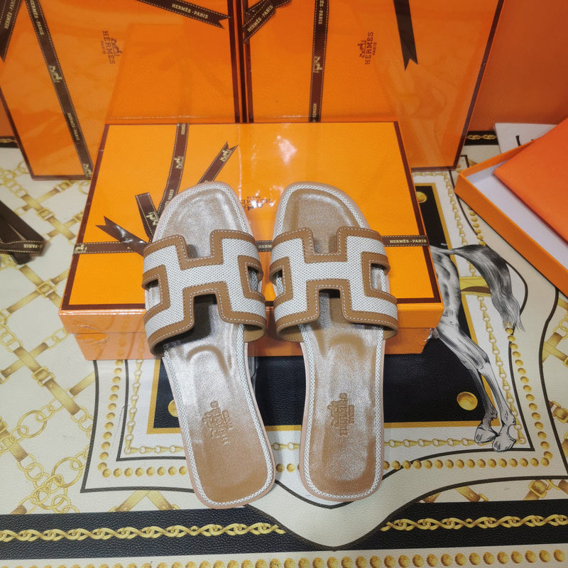 Hermes sandals Style 043 - angled studio shot