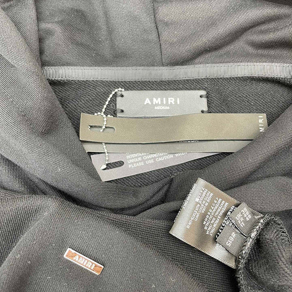 Three-quarter angle view of Amiri luxury piece style No.089