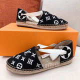 Louis Vuitton Beige Pointed-Toe Flats - Sole Detail View