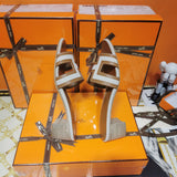 Hermes sandals Style 049 - angled studio shot