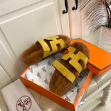 Hermès Burgundy Flat Thong Sandals - Lifestyle Styling Shot