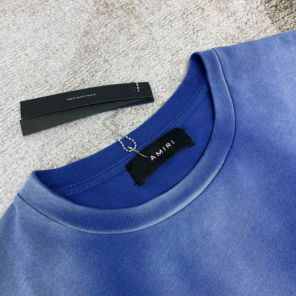 Close-up detail view of Amiri luxury piece style No.033