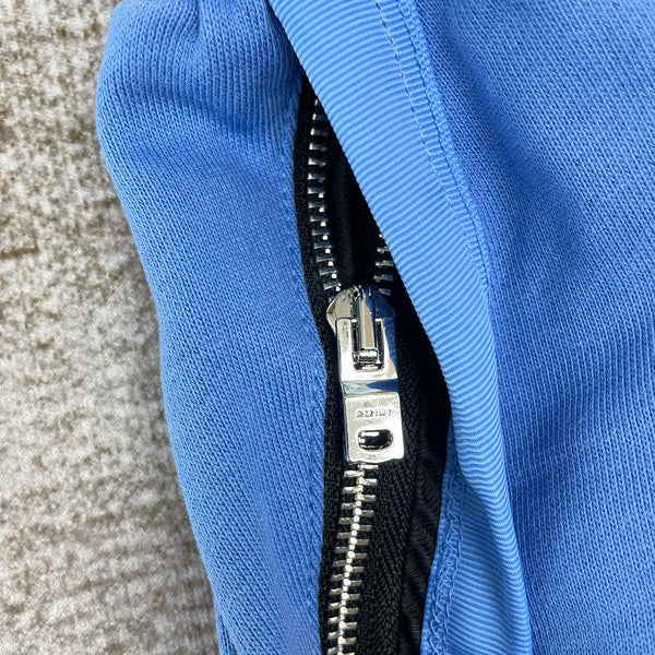 Three-quarter angle view of Amiri luxury piece style No.092