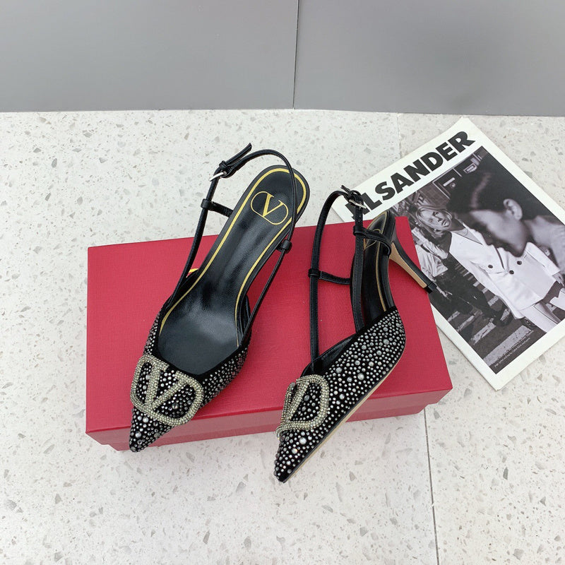 Three-quarter angle view of Valentino Garavani luxury piece style No.237