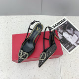 Three-quarter angle view of Valentino Garavani luxury piece style No.237