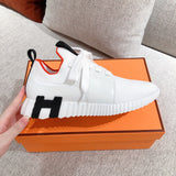 Hermès Nude Slip-On Sneakers - Angled View