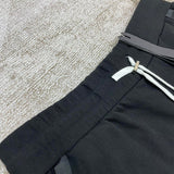 Three-quarter angle view of Amiri luxury piece style No.049