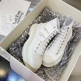 Alexander McQueen Tan Slip-On Sneakers - Close-Up Texture View