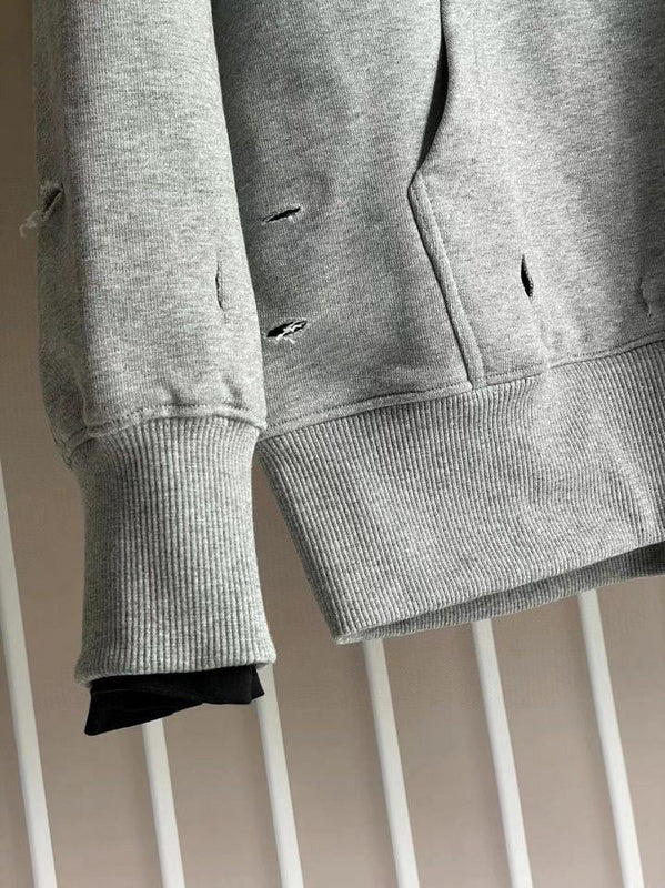 Texture and finish detail of Givenchy luxury piece style No.130