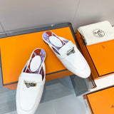 Hermès White Slide Sandals - Close-Up Texture View