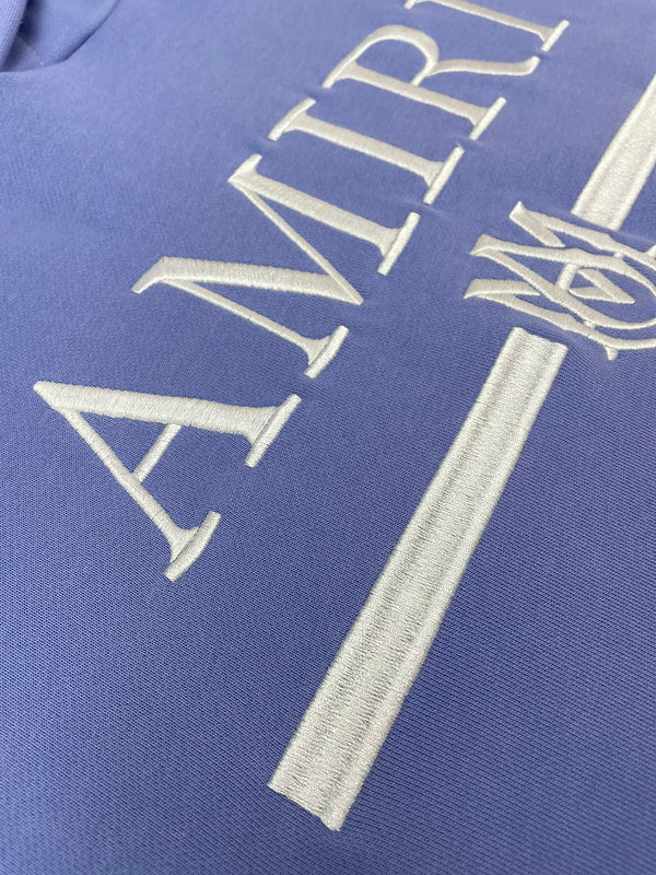 Three-quarter angle view of Amiri luxury piece style No.032