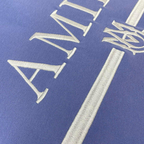 Three-quarter angle view of Amiri luxury piece style No.032