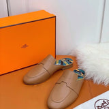 Hermès Black Loafer Flats - Close-Up Texture View