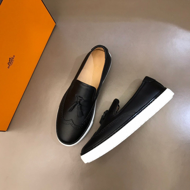 Hermes shoes Style 231 - close-up of iconic logo design