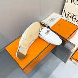 Hermès White Slide Sandals - Close-Up Texture View