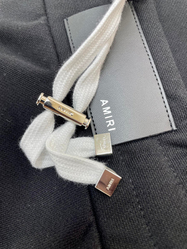 Front view of Amiri luxury piece style No.049