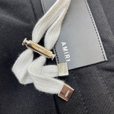 Front view of Amiri luxury piece style No.049