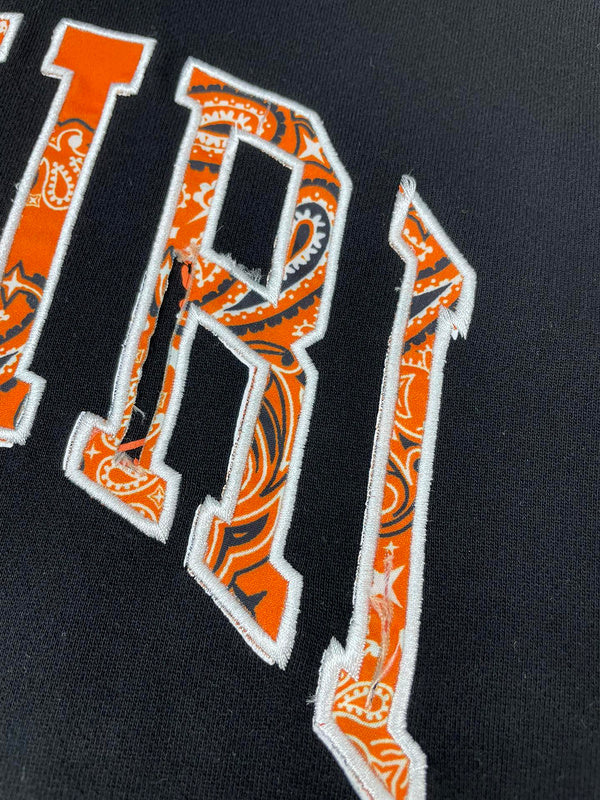 Close-up detail view of Amiri luxury piece style No.047