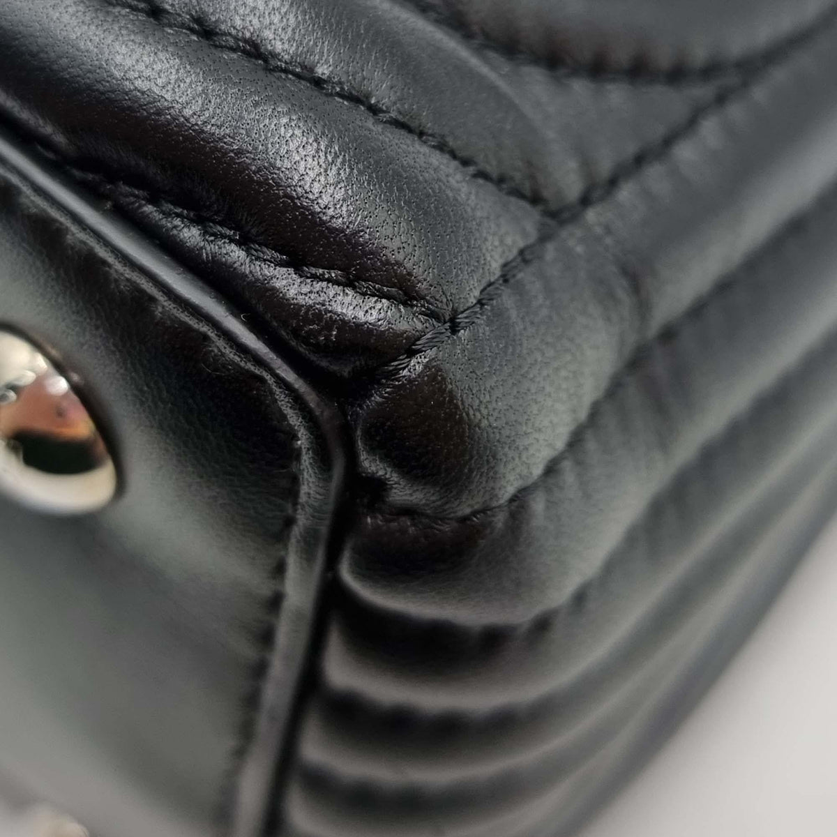DotCom bags luxury designer piece front view