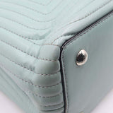 Close-up of DotCom bags hardware and fine stitching