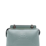 Close-up of DotCom bags hardware and fine stitching
