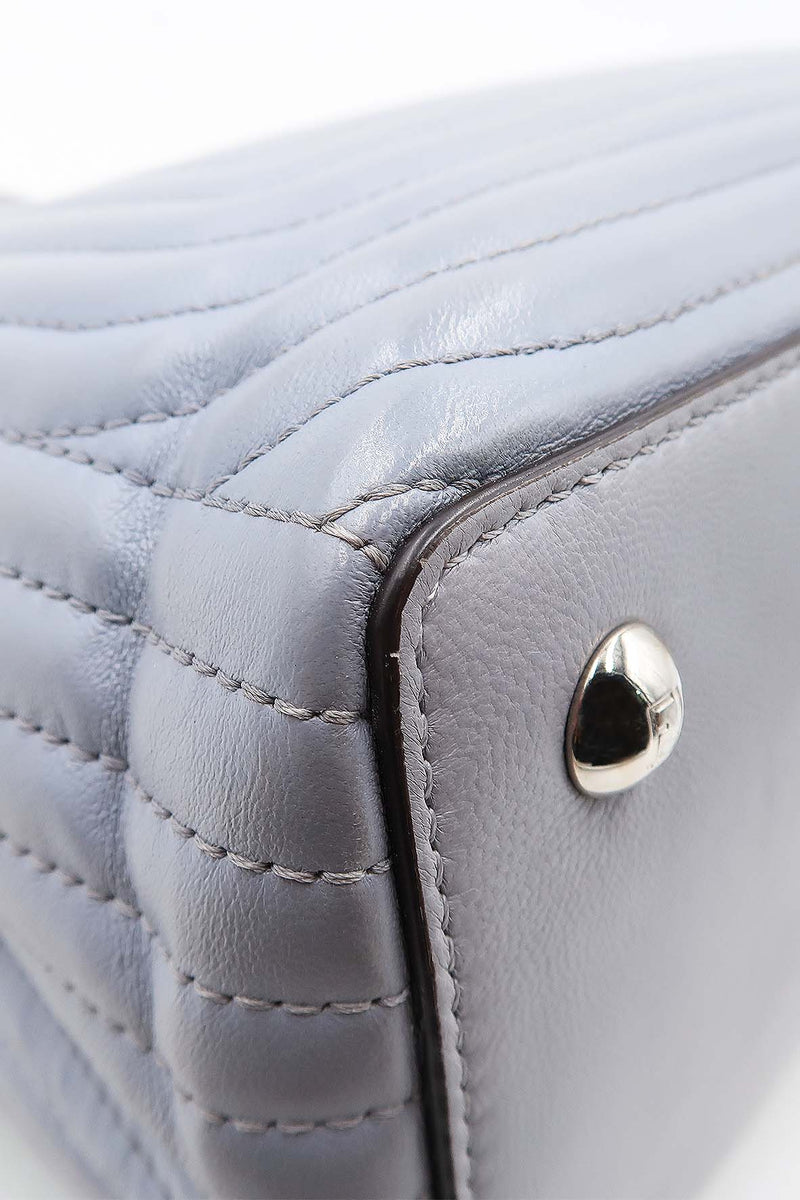 DotCom bags side profile designer luxury fashion