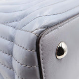 DotCom bags side profile designer luxury fashion