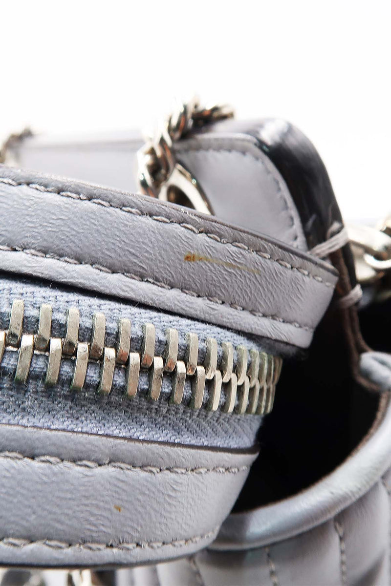 Close-up of DotCom bags hardware and fine stitching