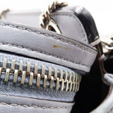 Close-up of DotCom bags hardware and fine stitching