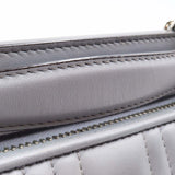 Close-up of DotCom bags hardware and fine stitching