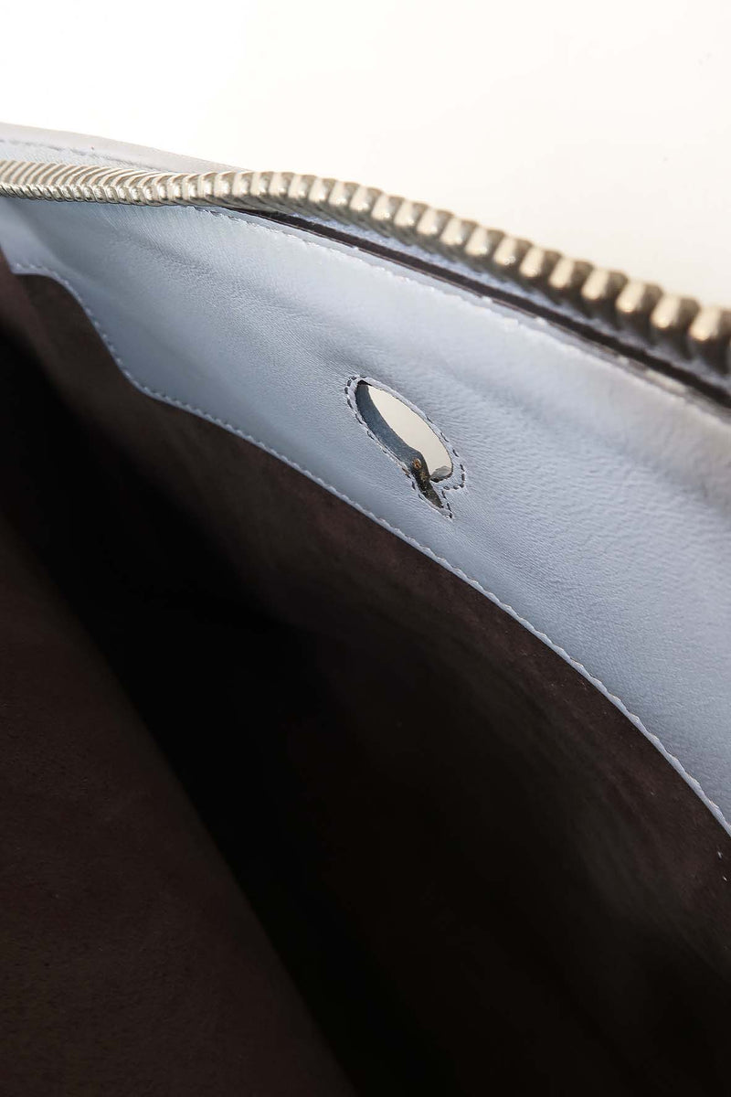 Close-up of DotCom bags hardware and fine stitching