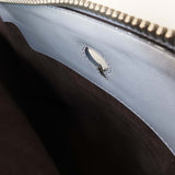 Close-up of DotCom bags hardware and fine stitching