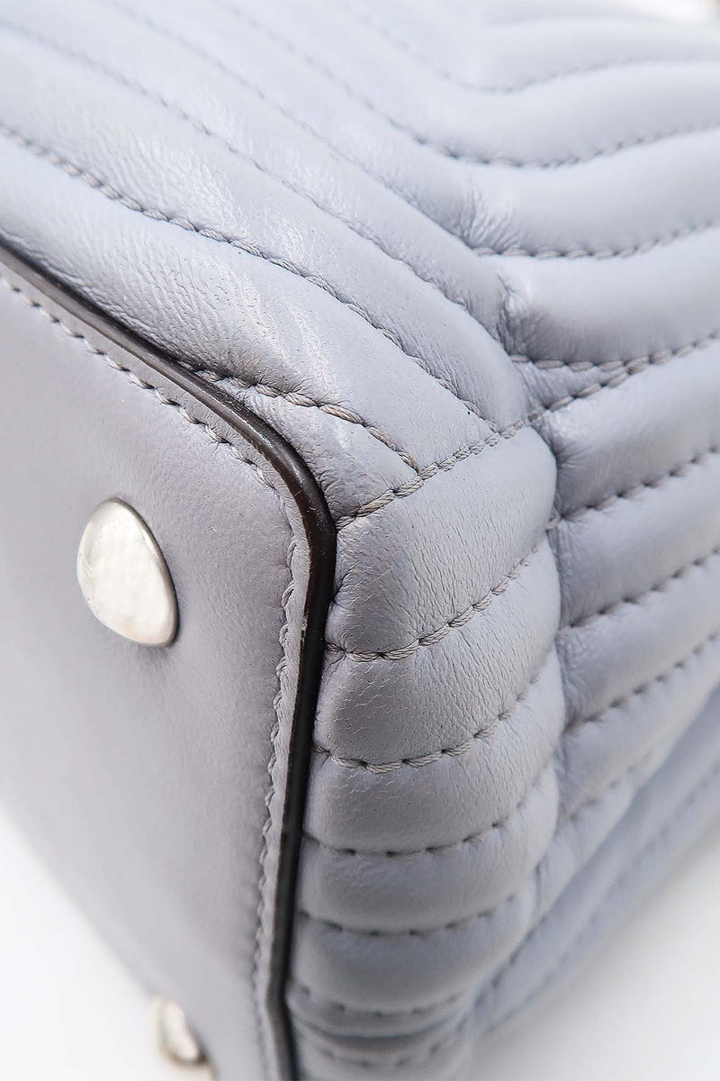DotCom bags luxury designer piece front view