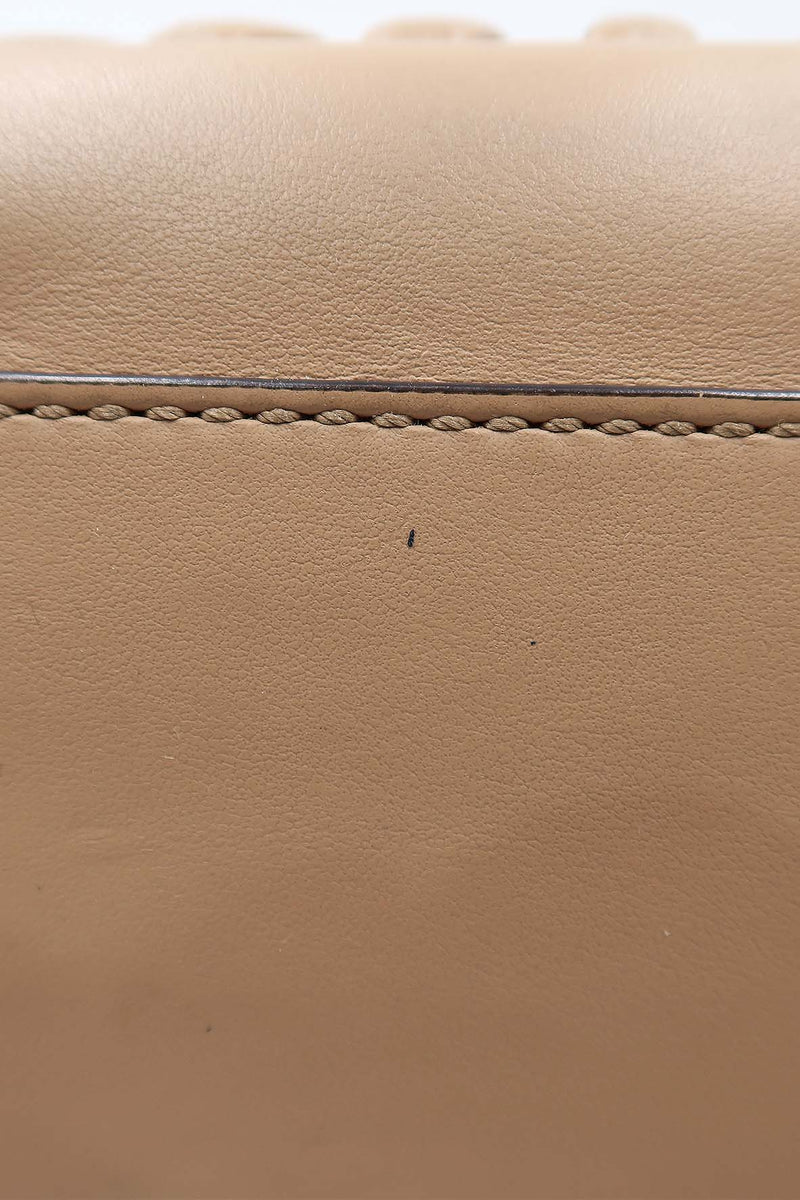 Close-up of Dotcom bags hardware and fine stitching