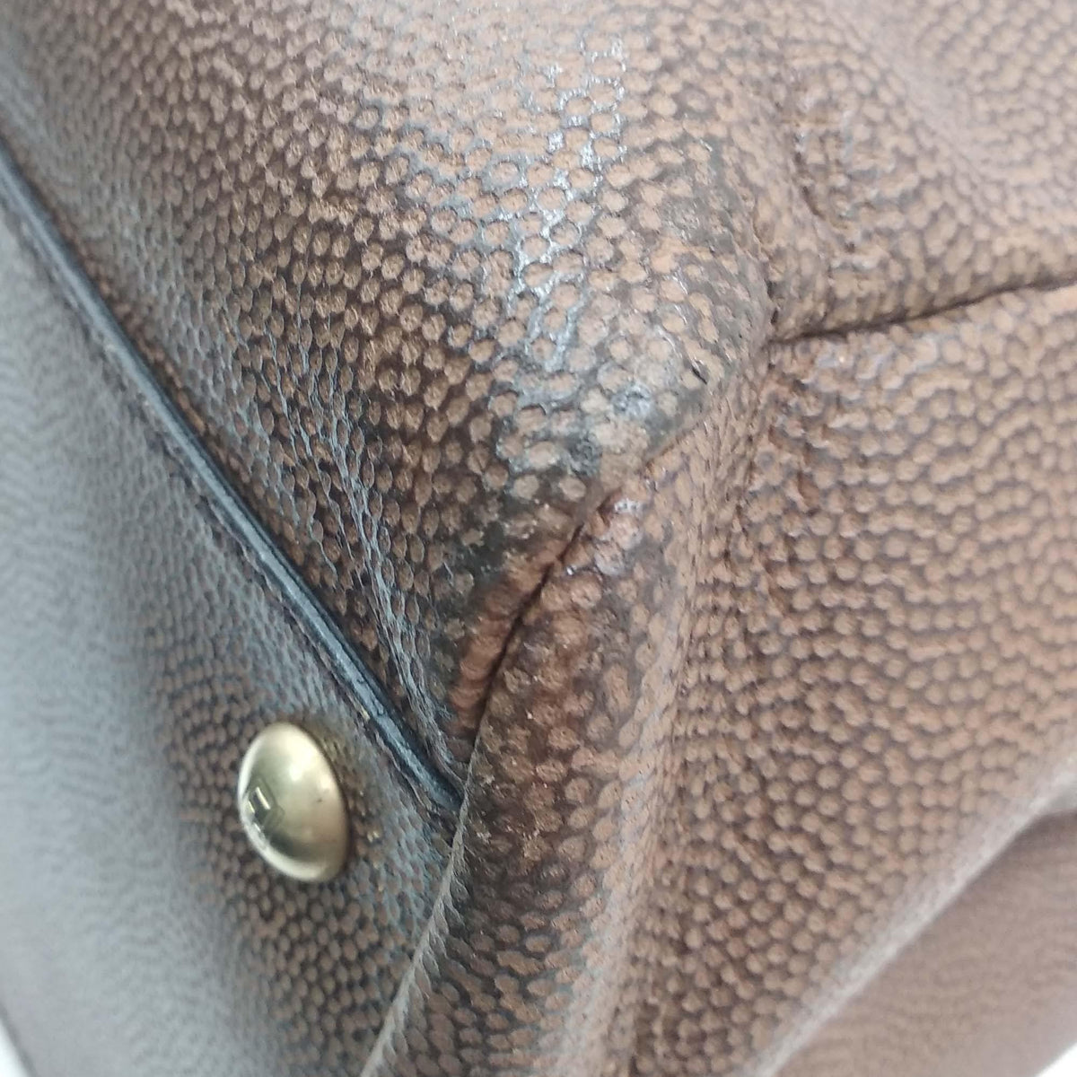 Close-up of Large bags hardware and fine stitching