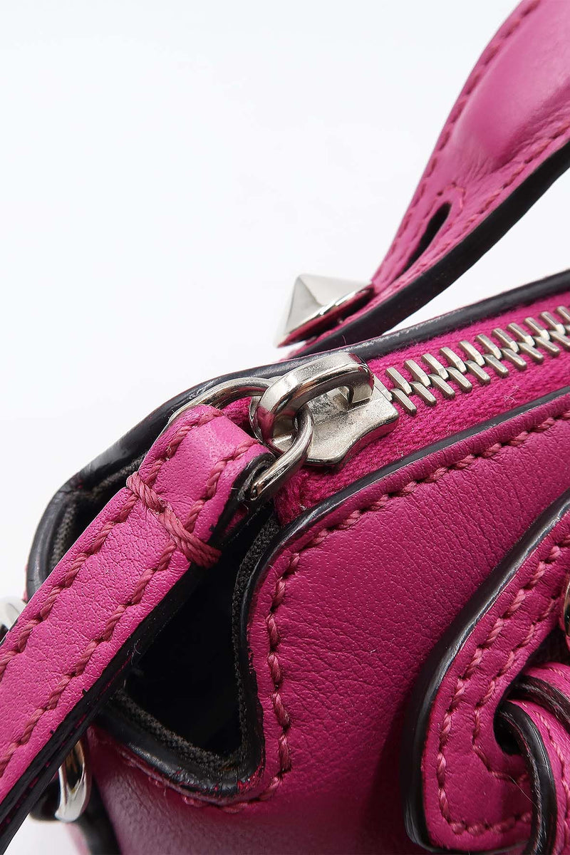 Close-up of Mini bags hardware and fine stitching